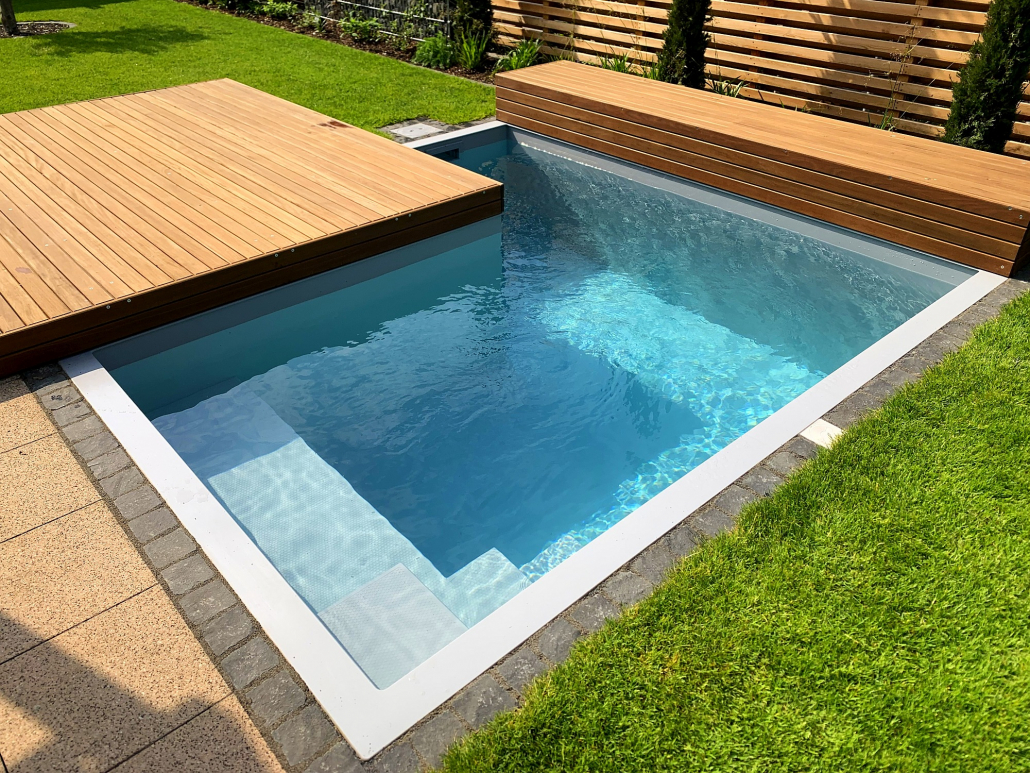 Dafne Sonderform / L-Form in grau mit Sitzbank